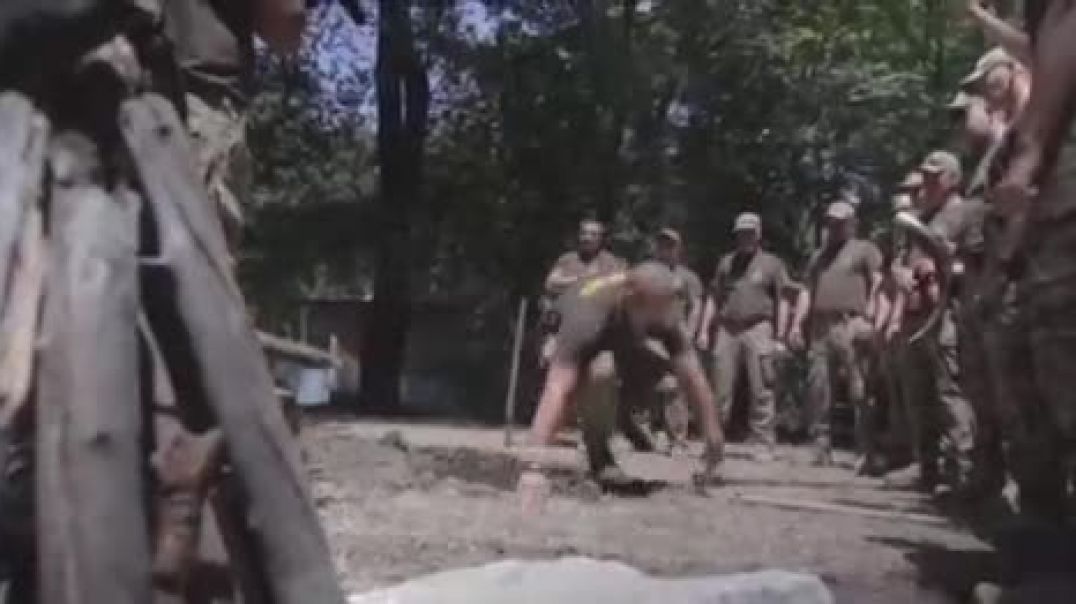 Ukrainian Azov Battalion Nazi’s Perform a Pagan Ritual on the Front Line
